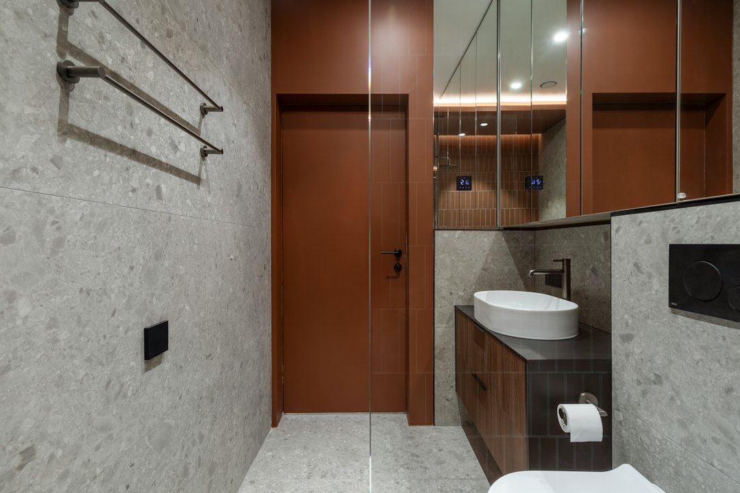 Compact apartment interior with bathroom door